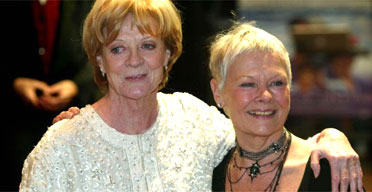 Dame Maggie Smith, left, and Dame Judi Dench attend the Royal Premiere of the film Ladies In Lavender