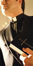 Priest with bible