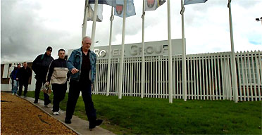Workers at MG Rover leave the Longbridge plant, Birmingham Thursday April 7, 2005 after production was suspended 