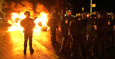 Anti-riot policemen patrol in the northern Paris suburb of Clichy-sous-Bois