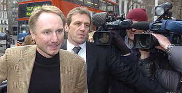 Dan Brown, author of the Da Vinci Code, arrives at court in London