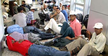 Workers stranded at Kuala Lumpur airport