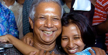 Bangladeshi Nobel peace prize winner Muhammad Yunus is hugged by his daughter Dina