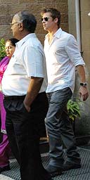 Brad Pitt leaves a meeting with the Mumbai police chief after the arrest of Angelina Jolies bodyguards