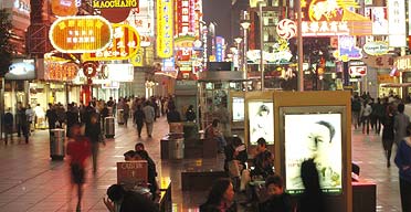 Consumers on Nanjing Road, Shanghai's major shopping street