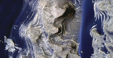 Scientists believe that spectacular images taken by Nasas Mars Reconnaissance Orbiter are evidence that water once ran under the surface of the planet