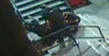 Frame 14 - CCTV footage of police