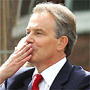 Britain's prime minister Tony Blair acknowledges supporters as he leaves the Trimdon Labour Club, in Sedgefield after announcing his resignation