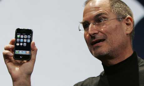 Apple boss Steve Jobs with the iPhone