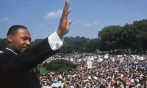 Martin Luther King Jr acknowledges the crowd after his I have a dream speech on the steps of the Lincoln Memorial in Washington DC, in August 1963.