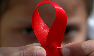 girl with Aids ribbon