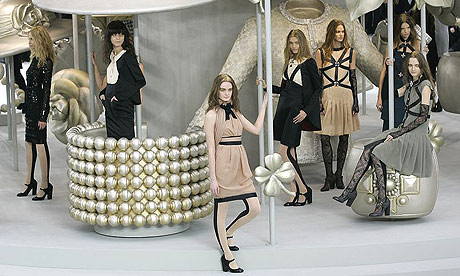 Models wear creations from German fashion designer Karl Lagerfelds Spring/Summer 2008 collection, in Paris.