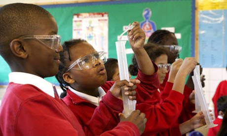 Pupils conduct an experiment in a science workshop at John Burns primary school in Battersea, south London Pupils conduct an experiment in a science workshop at John Burns primary school in Battersea, south London