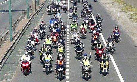 Bikers protest against rising fuel prices by staging a go-slow on the M62 in Salford and Manchester