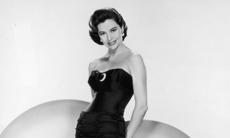1955 studio portrait of American actor and dancer Cyd Charisse