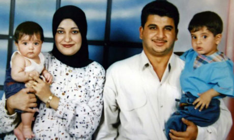 A family photograph of Baha Mousa with his wife and two children