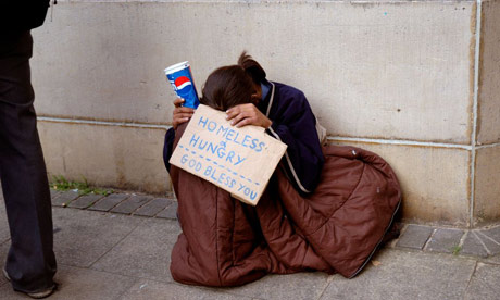 Young person homeless hungry and begging in London