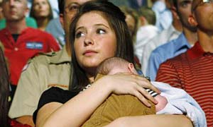 Bristol Palin holding her brother Trig at a campaign event