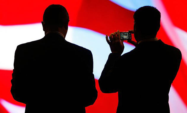 Man photographs stage at Republican convention
