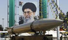 A missile in front of a poster of the Iranian supreme leader  Ayatollah Ali Khamenei during a military exhibition in Tehran, Iran