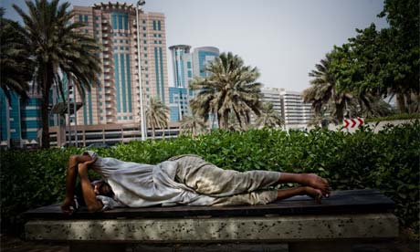 Workers sleep on the street in Dubai