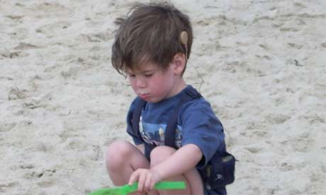 Charles Arthur's son Lachlan wearing a cochlear implant