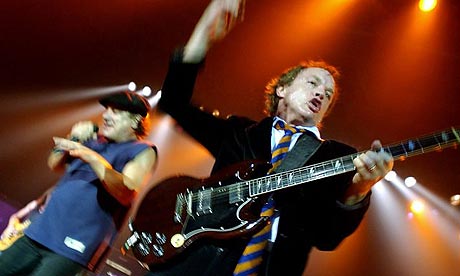 Angus Young (r) and lead vocalist Brian Johnson of AC/DC