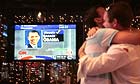  People celebrate the victory of US presidential candidate Barack Obama in a bar in Moscow