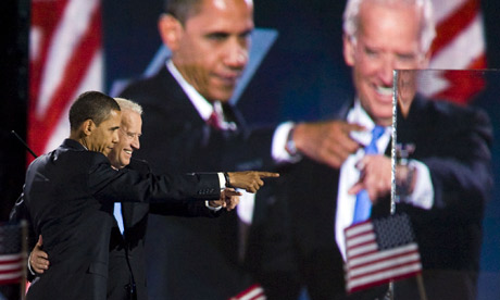 Barack Obama and Joe Biden celebreate their election victory in Chicago