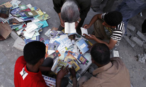 Iraqi booksellers in Baghdad's outdoor book bazaar