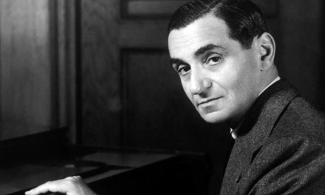 Irving Berlin sits at a piano. Photograph: Corbis