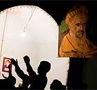 Iranian men celebrating the religious ceremony of Ashura