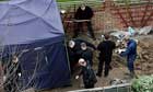 Investigators in the garden of Peter Tobin's former home