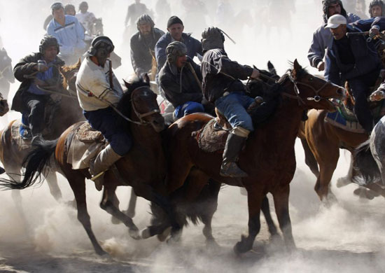 Gallery December 1 2008: Tursunzade, Takikistan: Horsemen compete in Buzkashi
