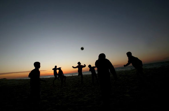 Gallery December 1 2008: Gaza City, Gaza: Youths play football at the al Shatea refugee camp