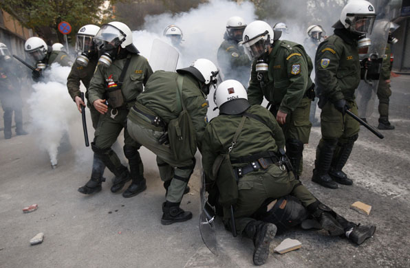 Gallery Greece riots: Police arrest a protester during clashes in Athens