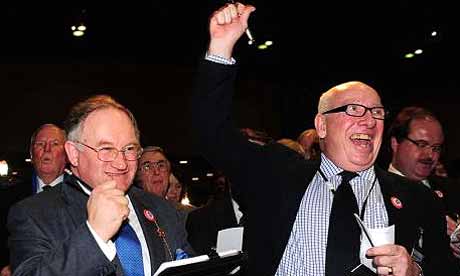 Councillors celebrate the result of the referendum into a congestion charge in Manchester