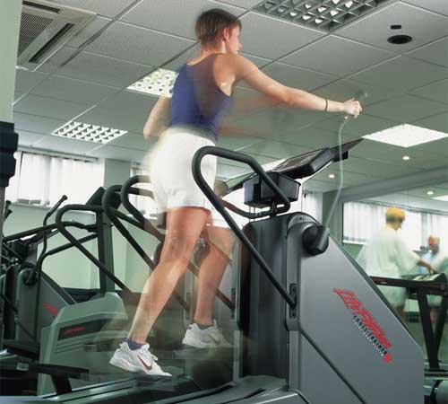 Woman using treadmill