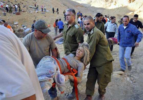 Gallery 17 December 1008: Eilat, Israel: A wounded passenger at the scene of a bus crash