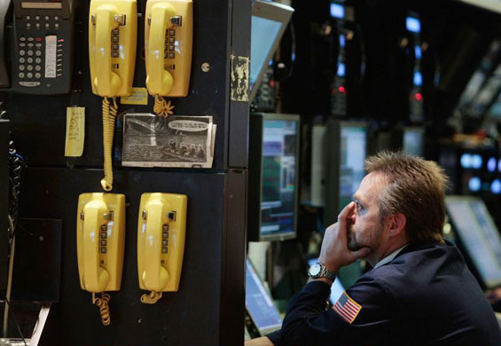 Gallery 17 December 1008: New York, US: A worker at the New York Stock Exchange