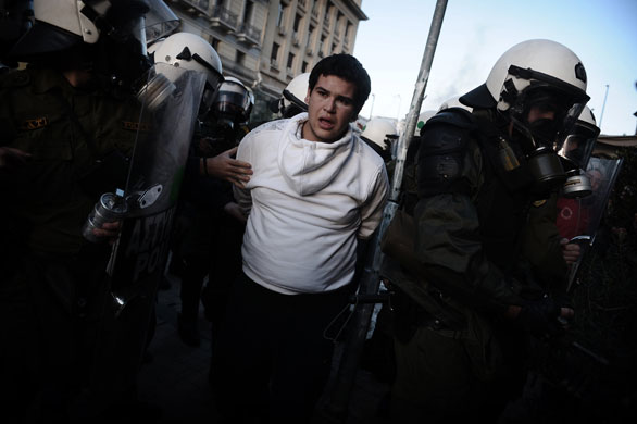 Gallery 19 December 2008: Athens, Greece: Anti-riot policemen arrest a protestor