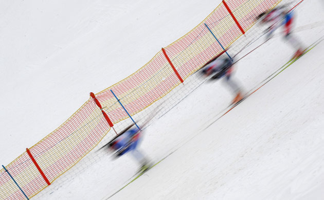 Gallery 19 December 2008: Competitors ski downhill in the men's 20 km individual biathlon World Cup