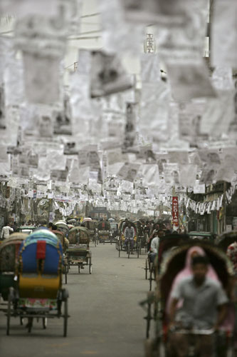Gallery 19 December 2008: Posters of candidates are seen on a street in Dhaka