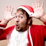 man in santa hat making rude gesture