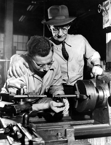 Gallery Michigan auto industry: apprentice being taught a trade in a General Motors factory in 1953