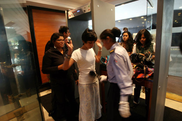 Gallery Mumbai hotels reopen: Security personnel search journalists at the Trident-Oberoi hotel 