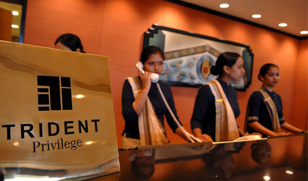 Gallery Mumbai hotels reopen: Indian receptionists at the entrance lobby of the Trident Hotel 