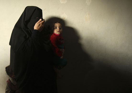 Gallery Mumbai: A relative of Palestinian Hijazi mourns during his funeral 