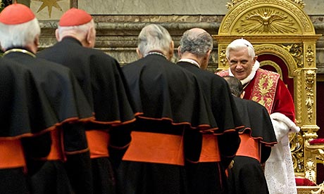 Pope Benedict XVI greets cardinals in the Clementine Hall at the Vatican