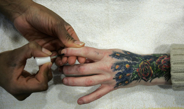 Gallery 24 hours in pictures: 24 hours in pictures: A homeless woman has a manicure